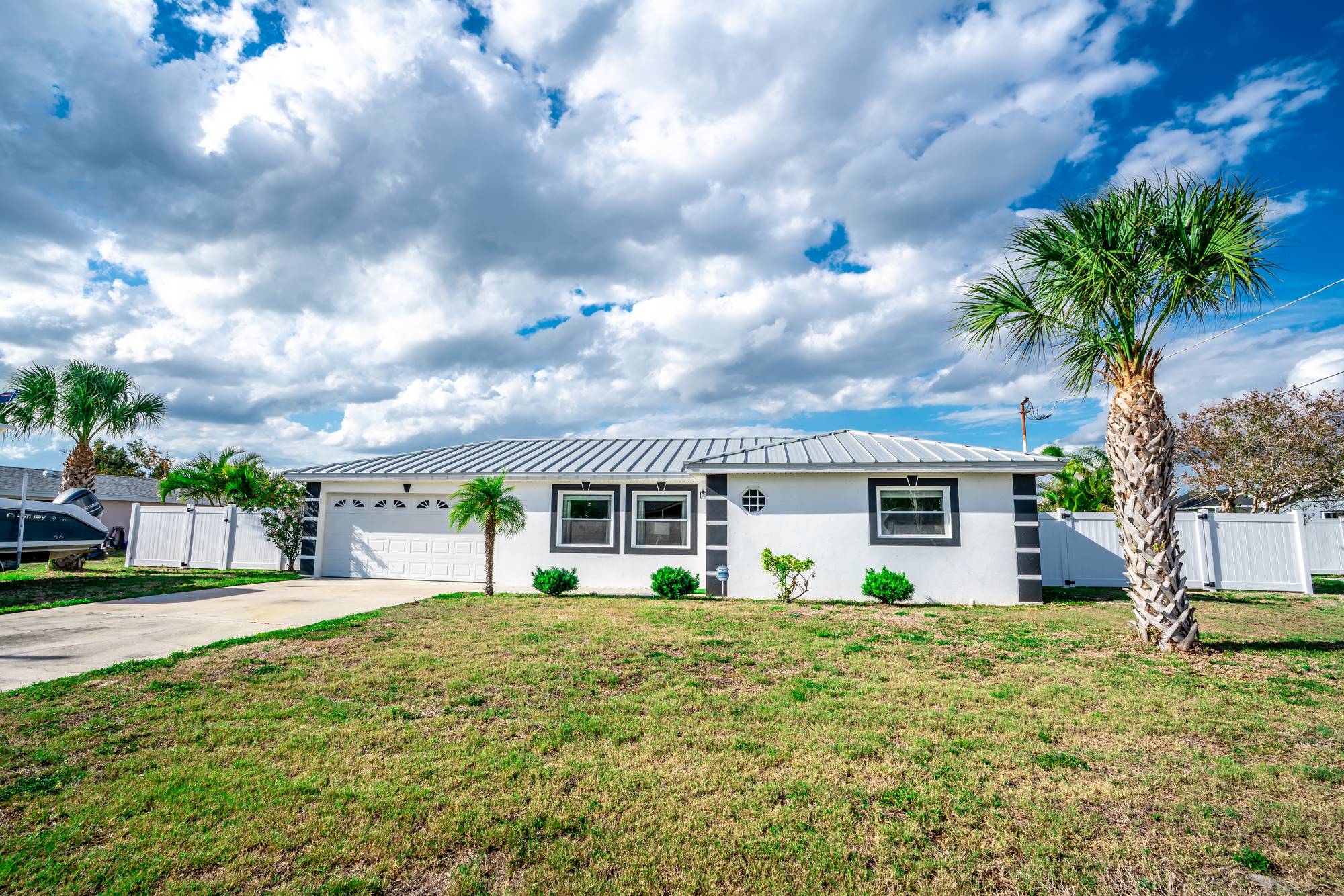 Front of a Florida home under a bright blue sky